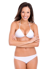 Fototapeta premium Woman, portrait and smile in bikini for fashion and beauty, poolside style with cosmetics and skin on white background. Healthy glow, wellness with model in beach wear or underwear with arms crossed