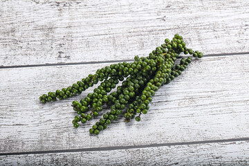 Fresh ripe green peppercon heap