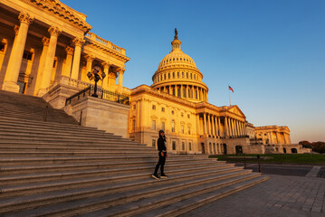 A tourist visit the Capitol Building in Washington, D.C., Enjoy sunrise in front of Capitol Building