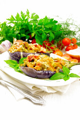 Eggplant stuffed smoked brisket in plate on board