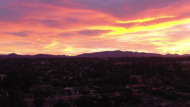 Vibrant sunrise over Chula Vista California, suburb of San Diego. Drone flight.