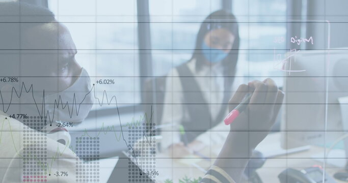 Image of financial data processing over businessman with face mask taking notes in office