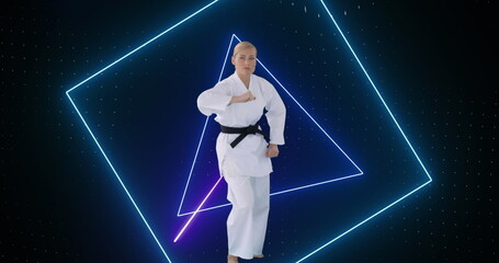 Image of purple neon scanner processing data over female martial artist