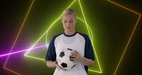 Image of neon scanner processing data and smiling caucasian female football player holding ball