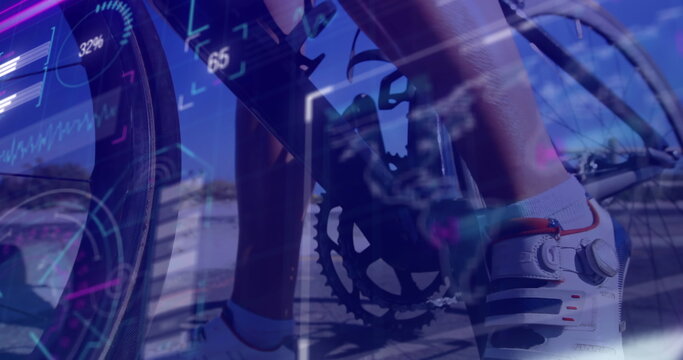 Fototapeta Image of interface and data processing over feet of cyclist