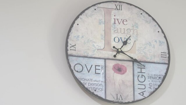 closeup shot of clock hanging on wall
