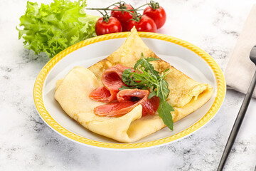 Russian pancake with salmon fish