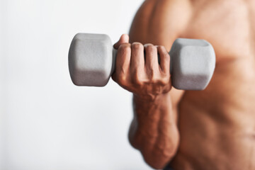 Closeup, hand and man with dumbbell, exercise and weights training for wellness and endurance....
