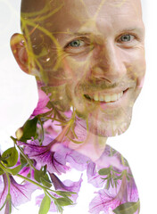 A double exposure portrait of a man combined with flowers on a white background - 740500531
