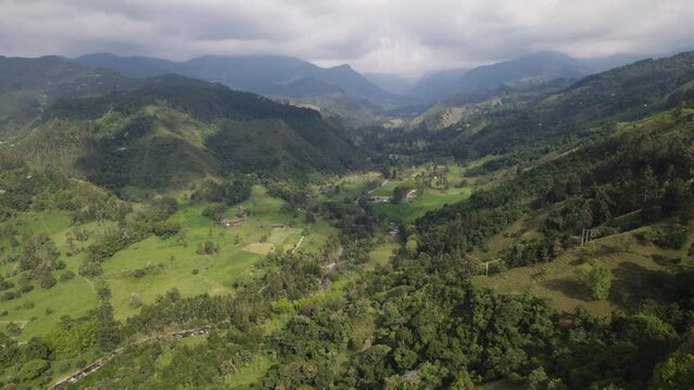 Aerial over coffee growing area in Salento, Colombia, green forest in the andes