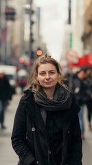 Fototapeta premium A woman standing out in a crowded street