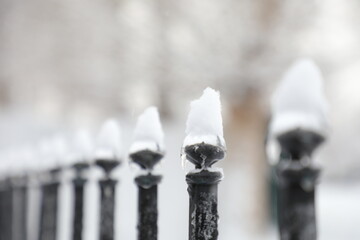 fence covered with snow and ice - Powered by Adobe