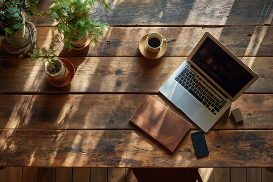 laptop tablet notebook and pensil on Vintage Wooden teble in garden coffee shop