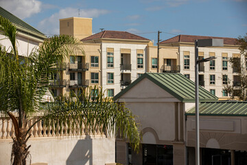Fototapeta na wymiar Palm framed view of the urban core of downtown Westminster, California, USA.