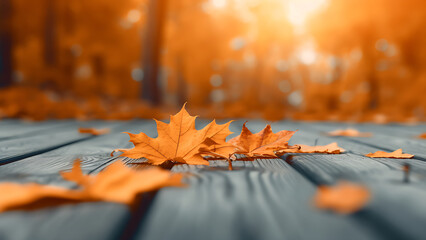 Naklejka na ściany i meble Blank wooden board with autumn leaves, orange gold maple leaves, blurry background.