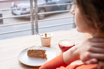 Unrecognizable Women Enjoying Coffee With Cake, Obscured Face