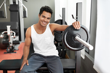 Bench, weights and portrait of man at gym with happiness for workout as body builder in Mexico....