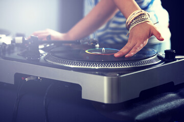 Hand, turntable and music for club performance as dj at techno rave for streaming audio track,...