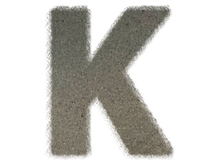 Letter K shape made of sand, isolated on PNG transparent background, suitable for template design