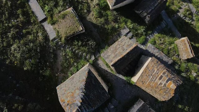Overlooking aerial City of Dead Dargavs North Ossetia City of Dead window into ancient history. City of Dead archaeological marvel Where every ruin tells story legacy etched in time.