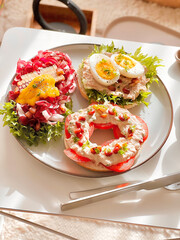 Open faced Bagel with tuna and mixed salads for breakfast. Morning time. Fresh meal. Delicious food. Scandinavian style. Homemade food. Cooking recipes. Brunch. Healthy recipes. Vegetable.Clean food. 
