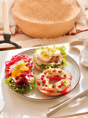 Open faced Bagel with tuna and mixed salads for breakfast. Morning time. Fresh meal. Delicious food. Scandinavian style. Homemade food. Cooking recipes. Brunch. Healthy recipes. Vegetable.Clean food. 