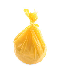 Yellow plastic garbage bag isolated on white