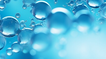 Macro of oil and water bubbles creating a scientific image of cell and cell membrane in blue with a vertical format.