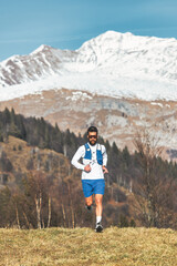 Ultra marathon runner in the mountains