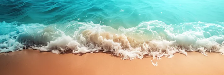 Möbelaufkleber empty sandy ocean beach with Cote d'Azur, foamy waves, clear sea, empty space for text, banner © yanapopovaiv