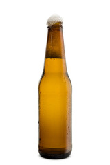 Bottle of blonde beer with foam, isolated on white background