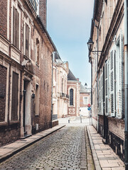 Street view of old village Cambrai in France