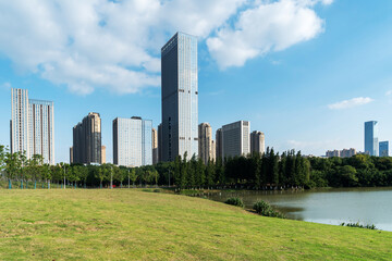 Fototapeta premium spring park and modern city