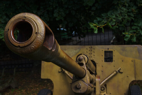Barrel of an Soviet anti-tank gun. Artillery gun close up. Shallow depth of field (DOF)