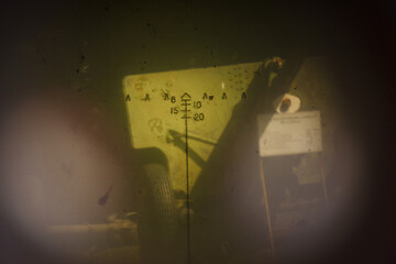 Photo through optical sight of Soviet old artillery gun. WWII period. Shallow depth of field (DOF)