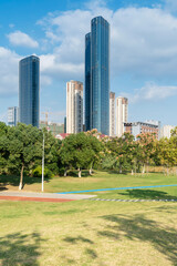spring park and modern city - 740564778