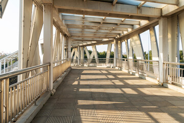 Inside of a modern overhead pedestrian bridge - 740567914