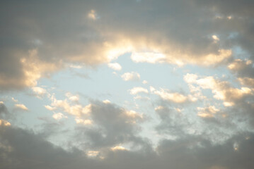 Fototapeta na wymiar Real majestic sunrise sundown sky background with gentle colorful clouds