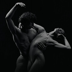 Portrait of passion and love. Talented, artistic young man and woman, ballet dancers making...