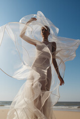 Fototapeta na wymiar Bride with white wail and a blue sky. Wedding concept.