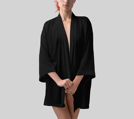 Template of black kimono on slender girl, silk robe on woman front view, place for design, print, pattern, branding. - obrazy, fototapety, plakaty