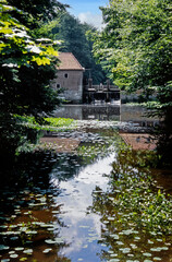 Fototapeta na wymiar Traditional watermill at Sincgraven Denekamp Twente Netherlands. Nineties