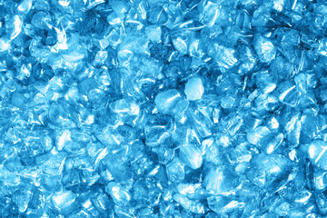 Glass pieces texture. Broken glass pattern. Shattered crystal glass frame. Decorative blue wall....