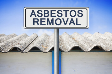 Asbestos removal concept image with text written on a placard