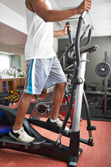 Fitness, legs and air walker with man in gym for health, wellness or workout to improve cardio. Exercise, running and sports with athlete on glider machine for endurance . training as marathon runner