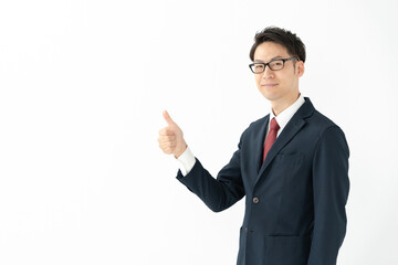 グッドポーズをするビジネスマン