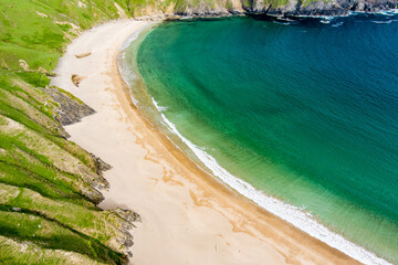 Silver Strand, a sandy beach in a sheltered, horseshoe-shaped bay, situated at Malin Beg, near...
