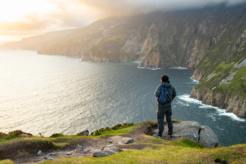 Tourist at Slieve League, Irelands highest sea cliffs, located in south west Donegal along this...