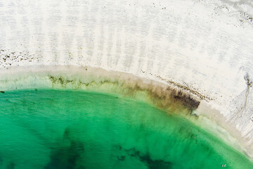 Aerial view of sandy Kilmurvey Beach on Inishmore, the largest of the Aran Islands in Galway Bay, Ireland.