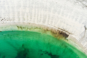 Aerial view of sandy Kilmurvey Beach on Inishmore, the largest of the Aran Islands in Galway Bay,...